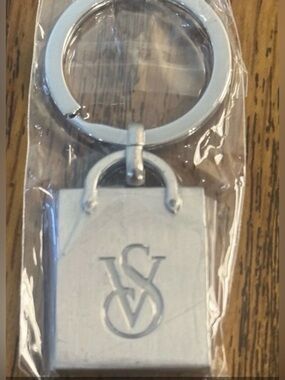 Victoria's Secret stainless steel keychain with a laser-cut VS logo